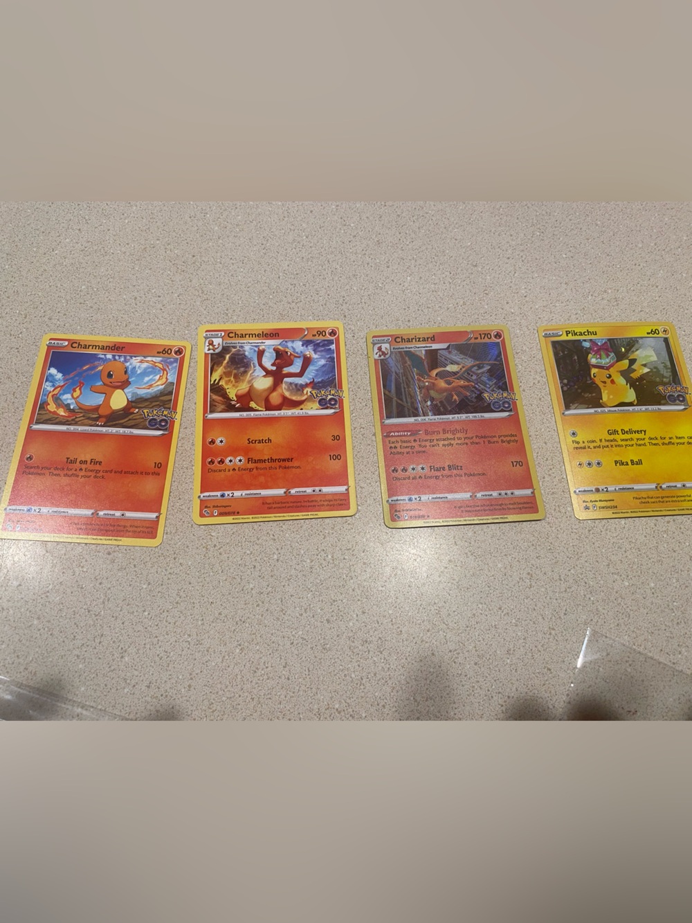 Pokémon Go- Charizard, Charmeleon, Charmander & Pikachu Promo Mint